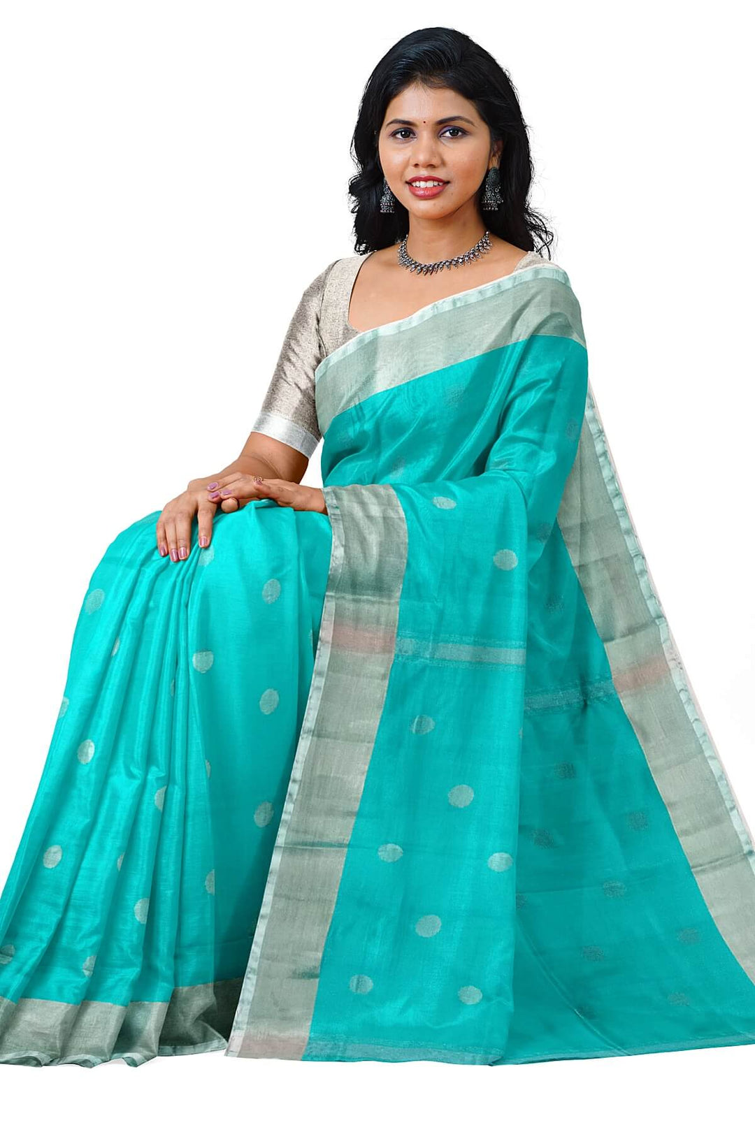 Handwoven Uppada pure silk saree in teal blue with silver motifs