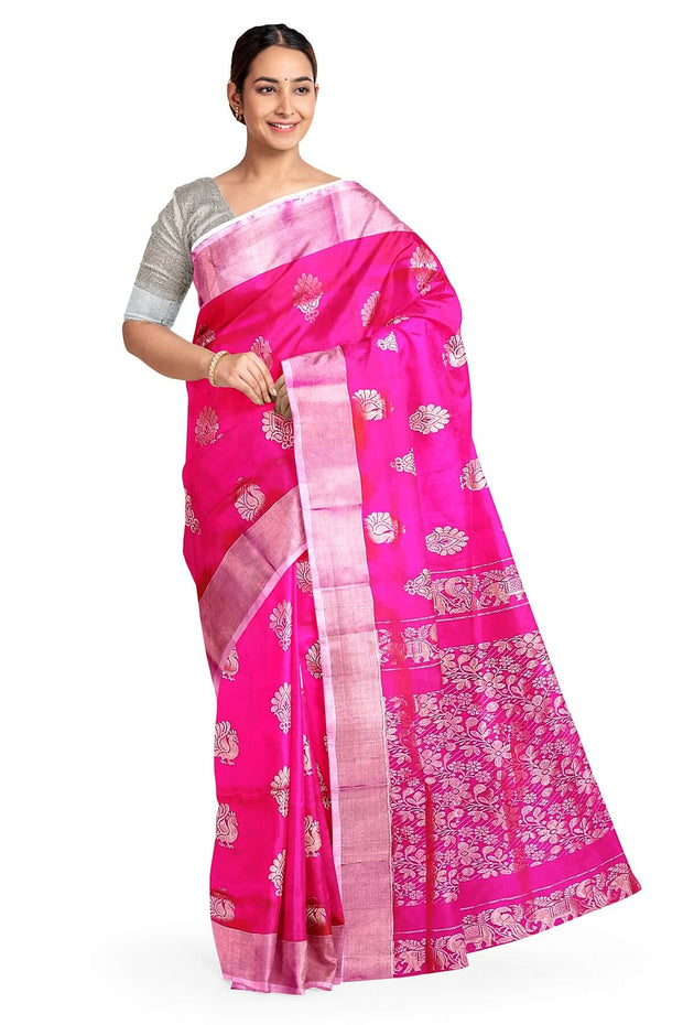Handwoven Uppada pure silk saree in rani pink with  floral motifs .