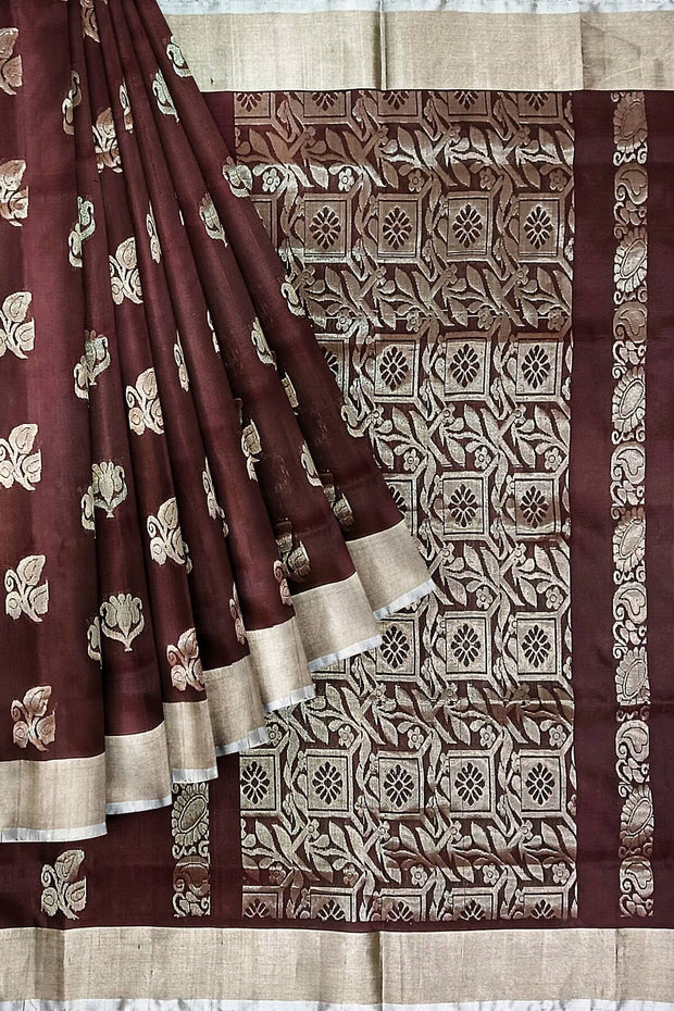Handwoven Uppada pure silk saree in brown with  floral motifs .