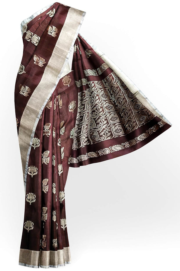 Handwoven Uppada pure silk saree in brown with  floral motifs .