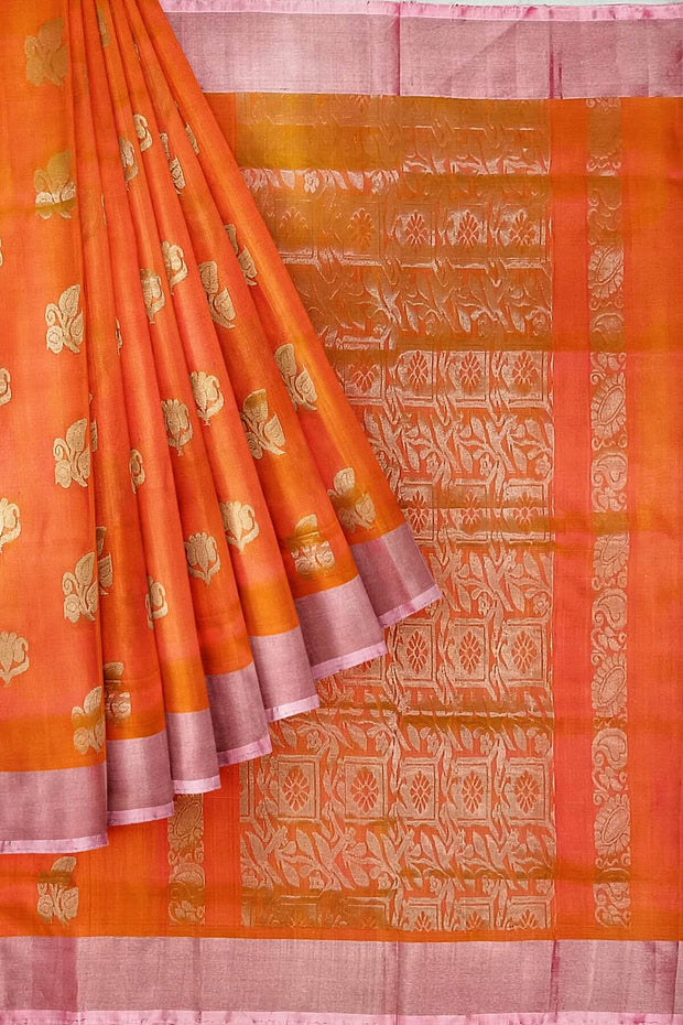 Handwoven Uppada pure silk saree in peach with  floral motifs .