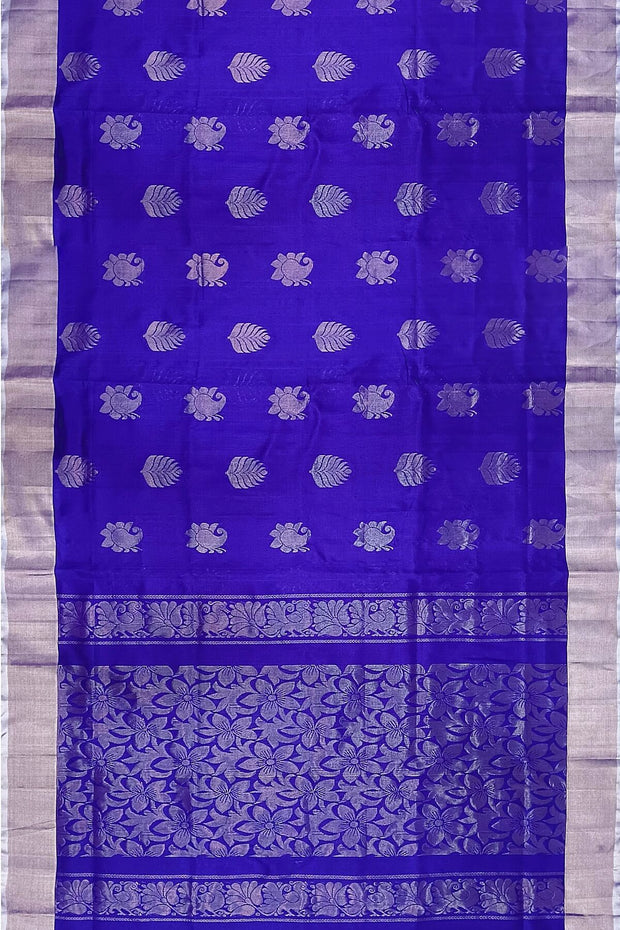 Handwoven Uppada pure silk saree in royal blue with  floral motifs .