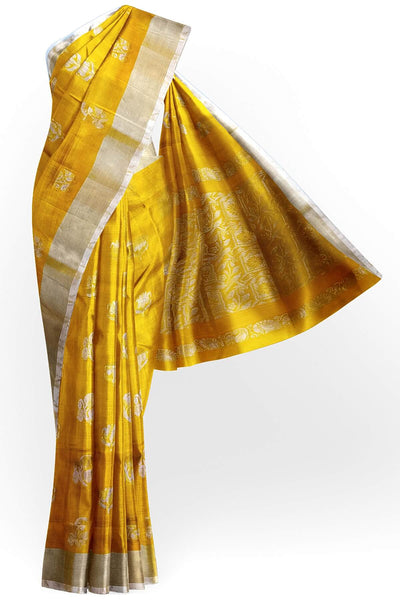 Handwoven Uppada pure silk saree in yellow with  floral motifs .