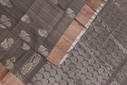 Handwoven Uppada pure silk saree in grey with  floral motifs .