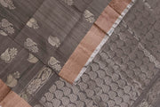 Handwoven Uppada pure silk saree in grey with  floral motifs .