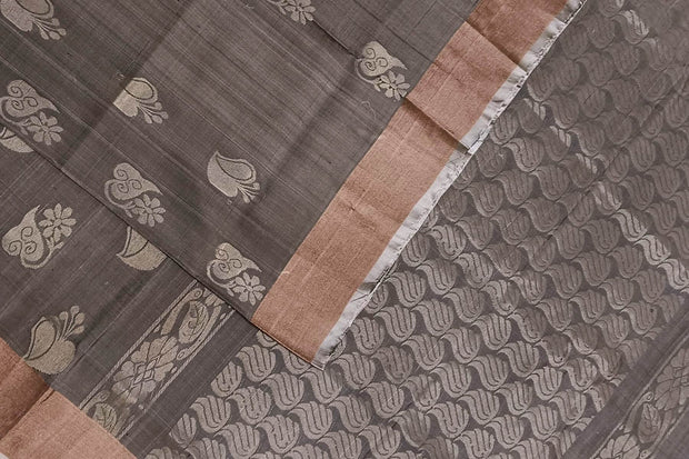 Handwoven Uppada pure silk saree in grey with  floral motifs .