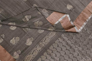 Handwoven Uppada pure silk saree in grey with  floral motifs .