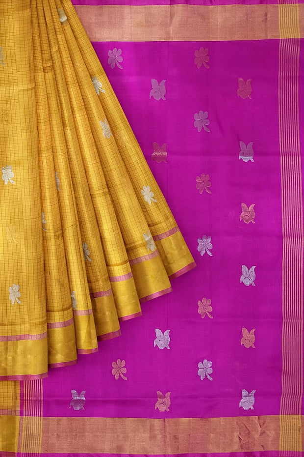 Handwoven Uppada pure silk saree in yellow in fine checks with gold & silver motifs.