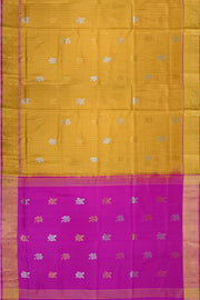 Handwoven Uppada pure silk saree in yellow in fine checks with gold & silver motifs.