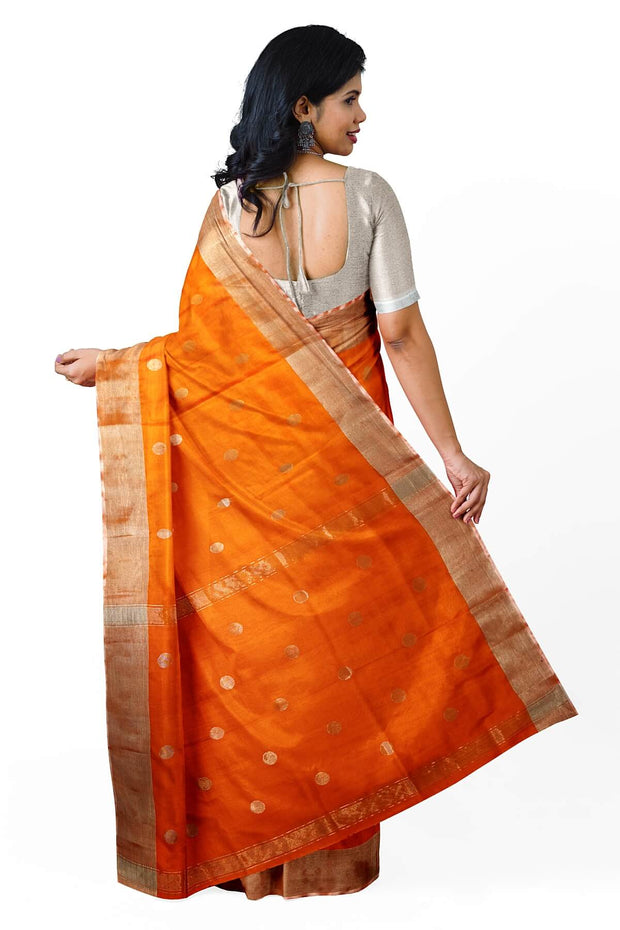 Handwoven Uppada pure silk saree in orange  with round motifs