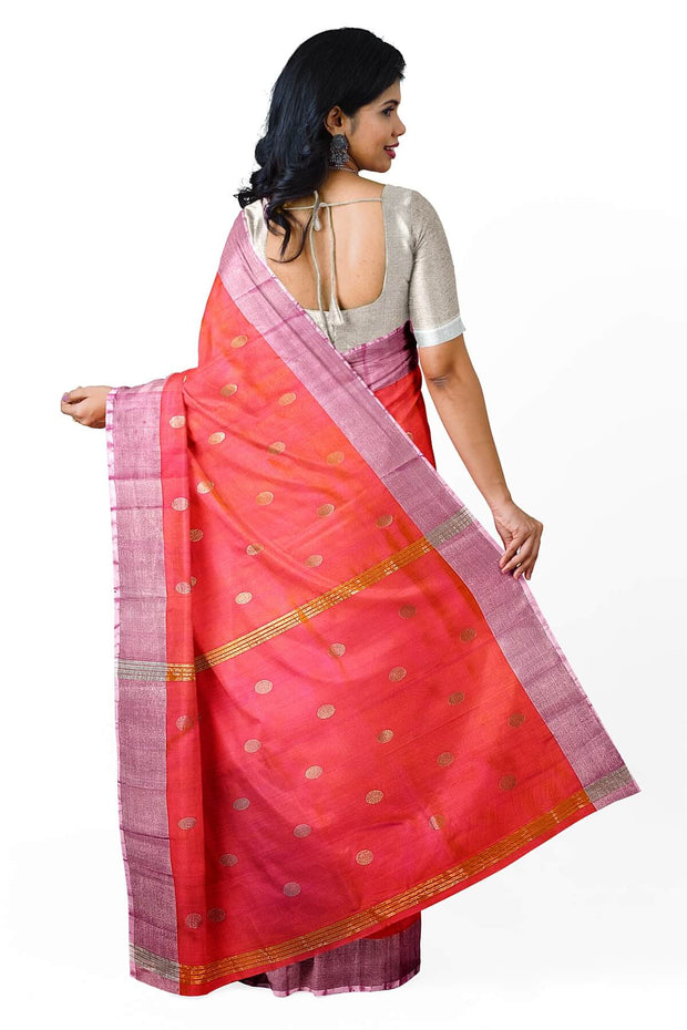 Handwoven Uppada pure silk saree in  orangish pink  with round motifs