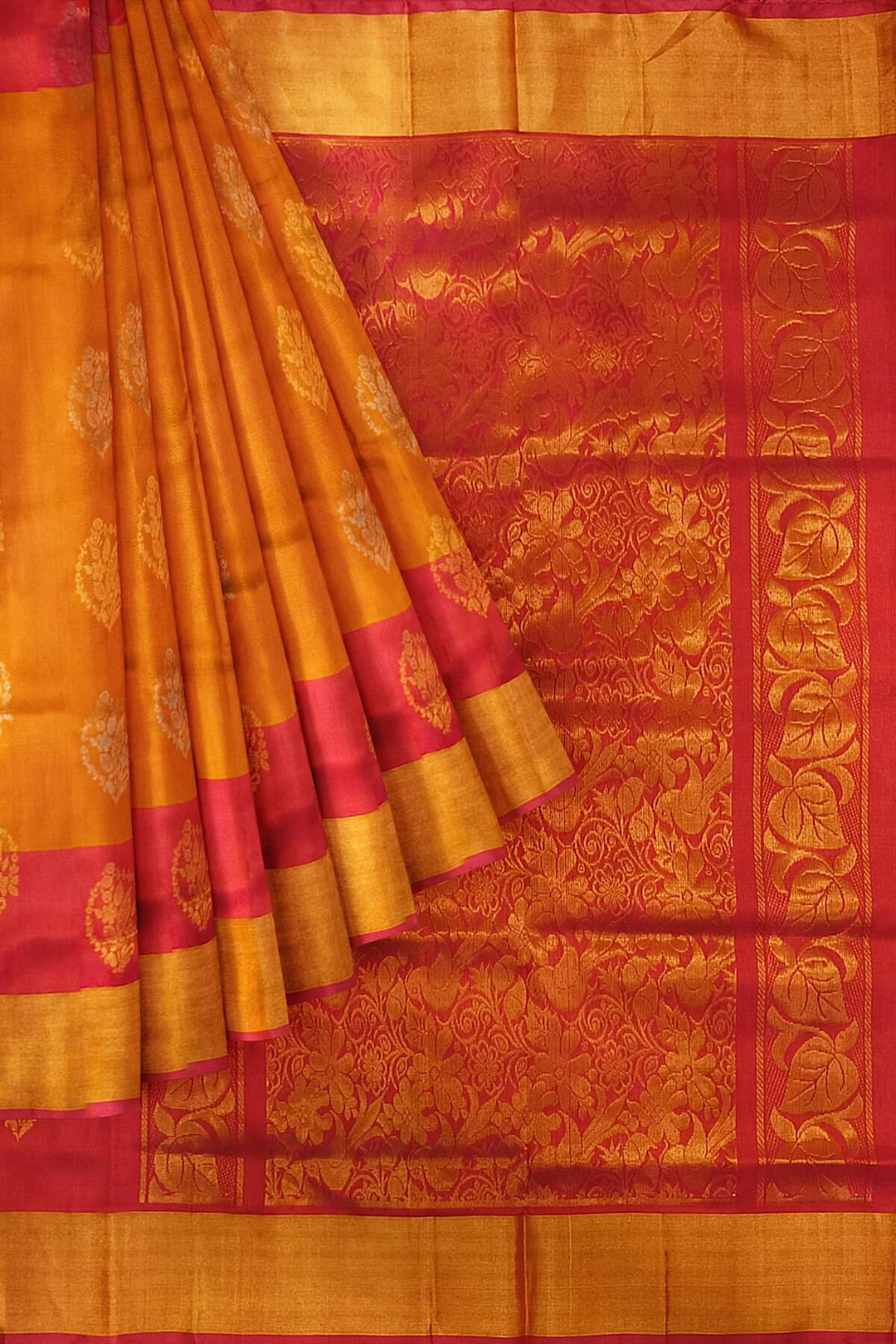 Handwoven Uppada pure silk saree in orange  with gold & silver motifs