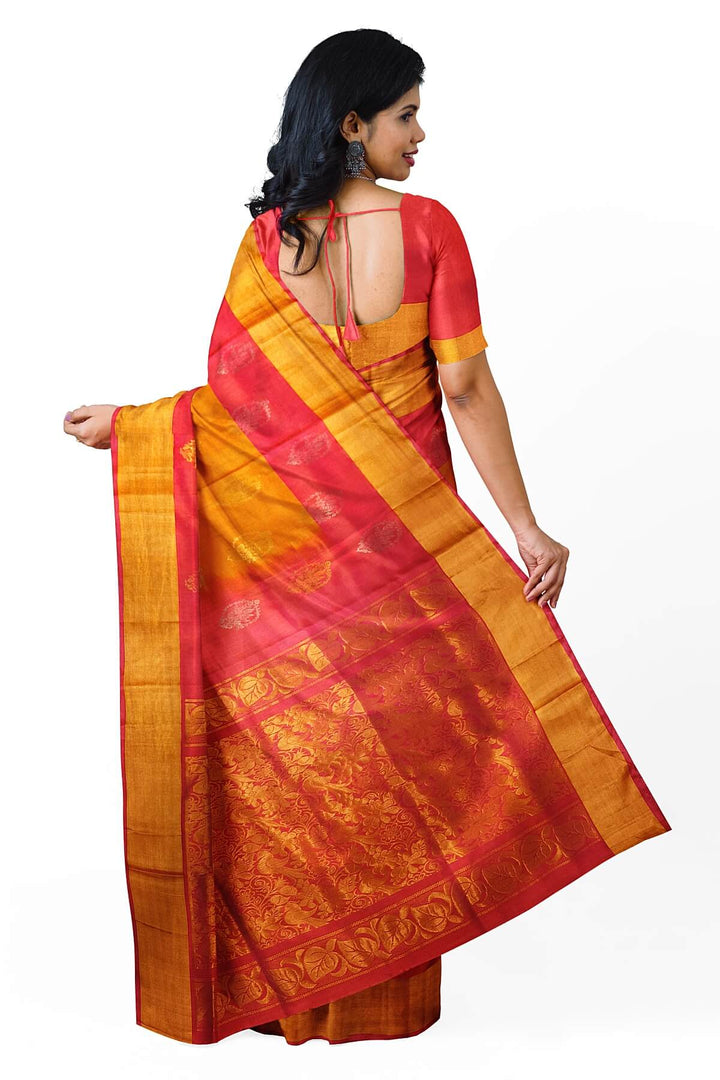 Handwoven Uppada pure silk saree in orange  with gold & silver motifs