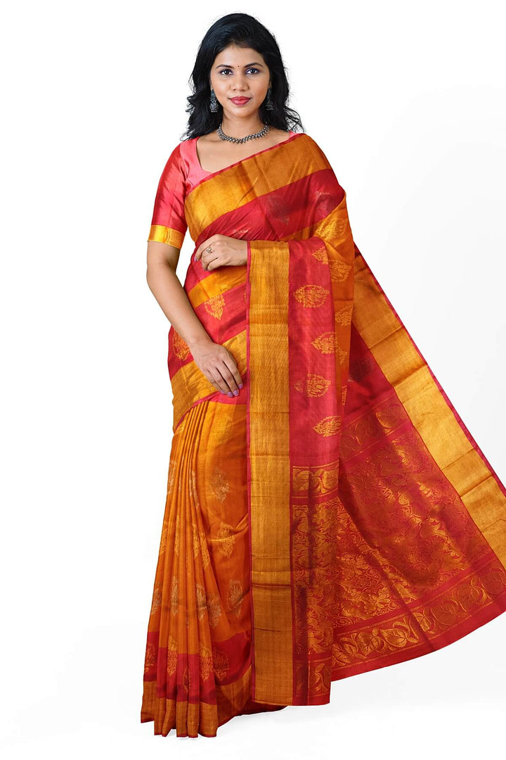 Handwoven Uppada pure silk saree in orange  with gold & silver motifs