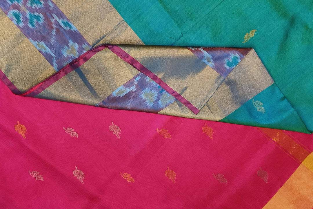 Handwoven Uppada pure silk saree in teal blue with Pochampally border