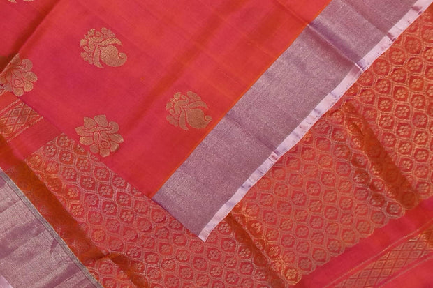 Handwoven Uppada pure silk saree in orangish pink with floral motifs
