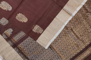 Handwoven Uppada pure silk saree in coffee brown with floral motifs