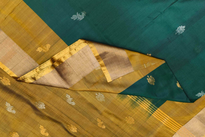 Handwoven Uppada pure silk saree in  two tone bottle green with gold & silver motifs