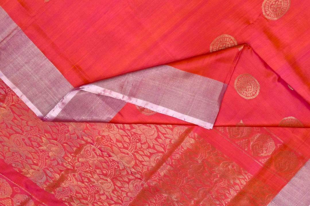 Handwoven Uppada pure silk saree in two tone pink with  floral motifs .