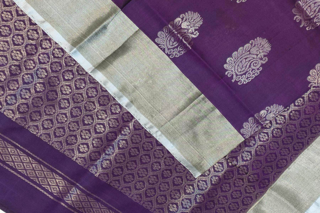 Handwoven Uppada pure silk saree in violet with  floral motifs .