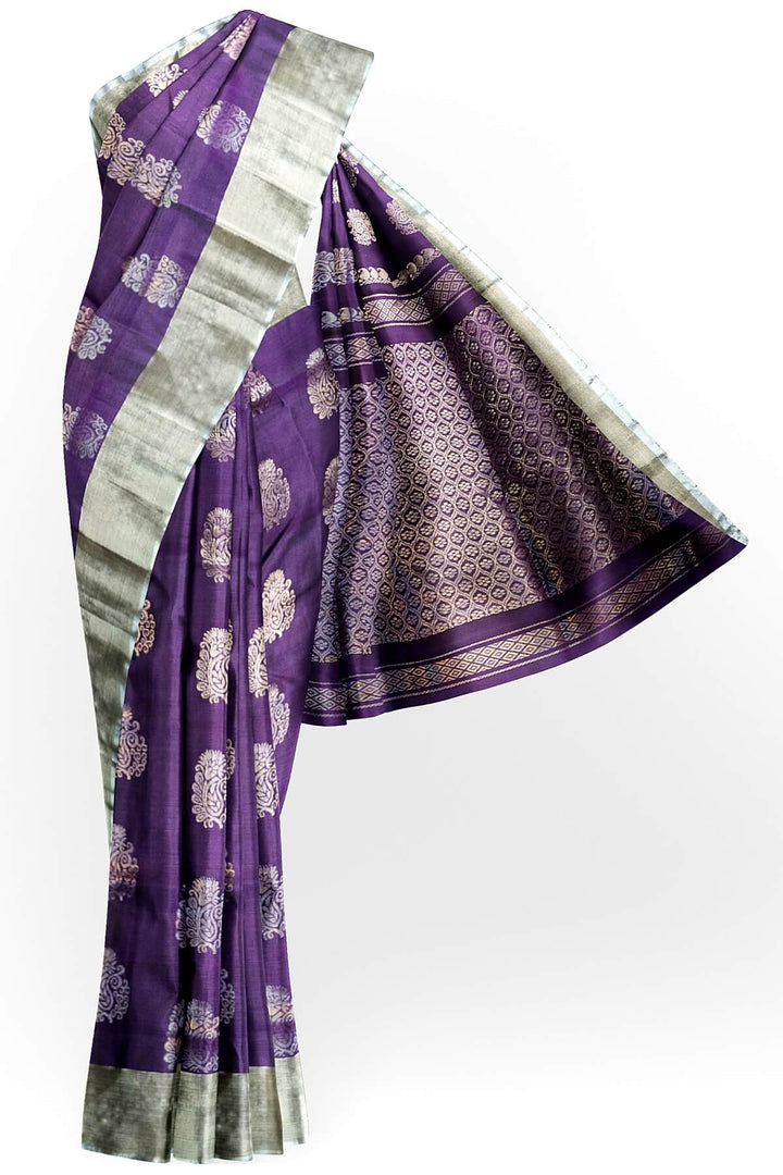 Handwoven Uppada pure silk saree in violet with  floral motifs .
