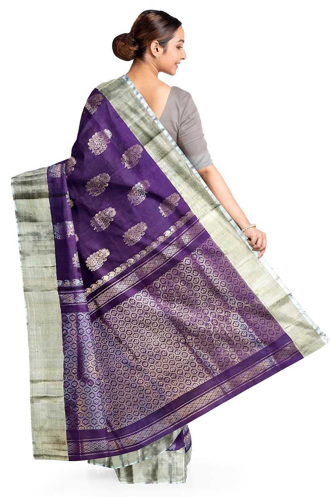 Handwoven Uppada pure silk saree in violet with  floral motifs .