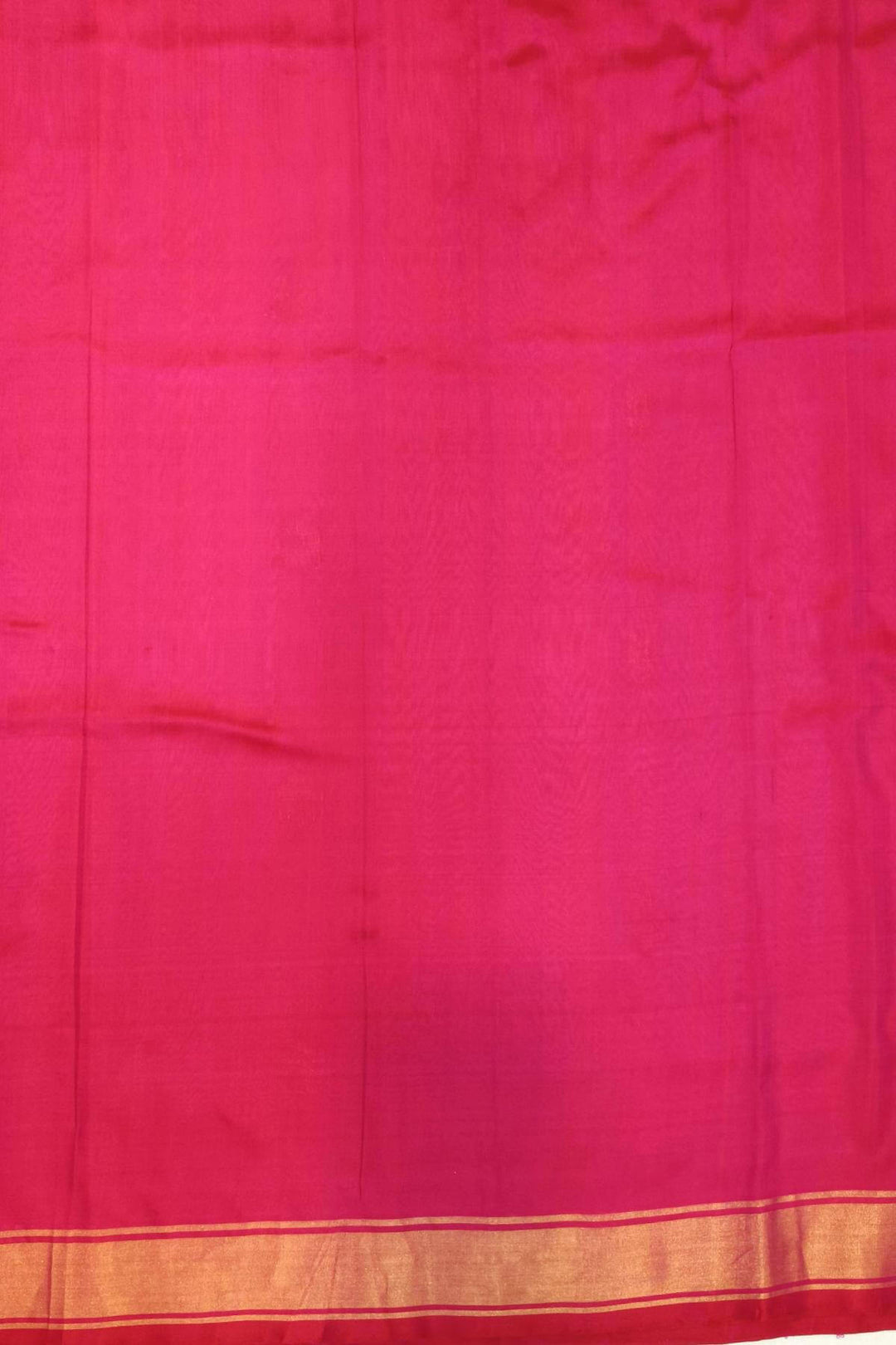 Handloom Uppada pure silk saree in rani pink with rich pallu and a  small border