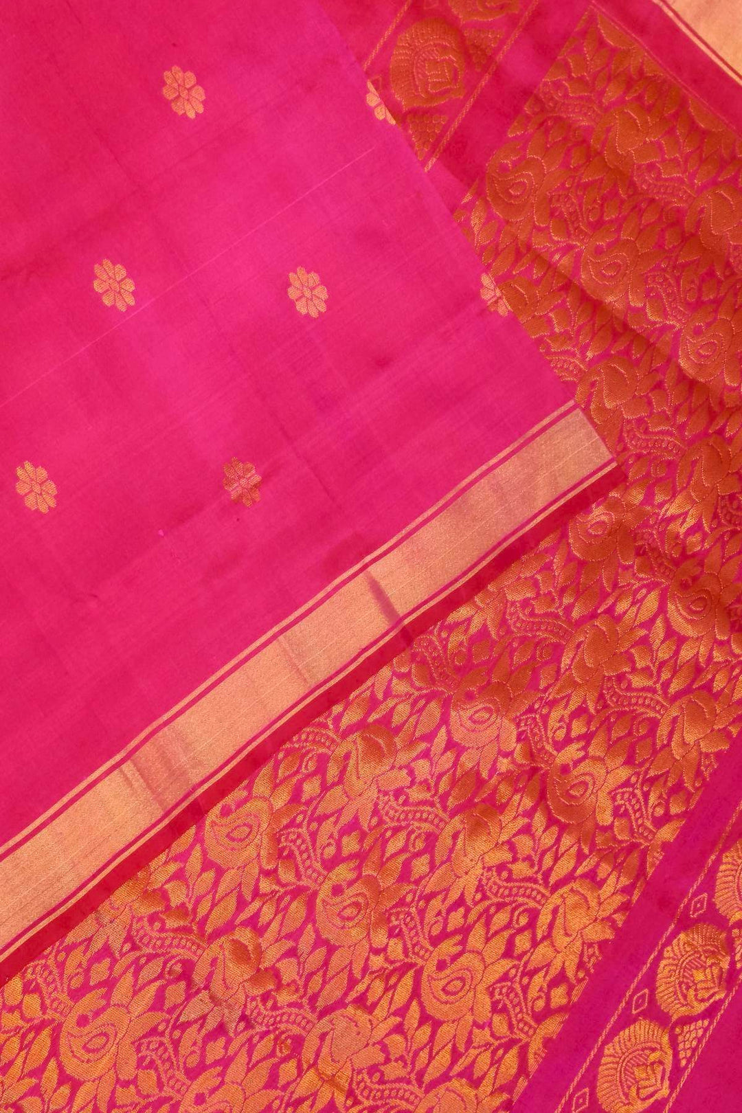 Handloom Uppada pure silk saree in rani pink with rich pallu and a  small border