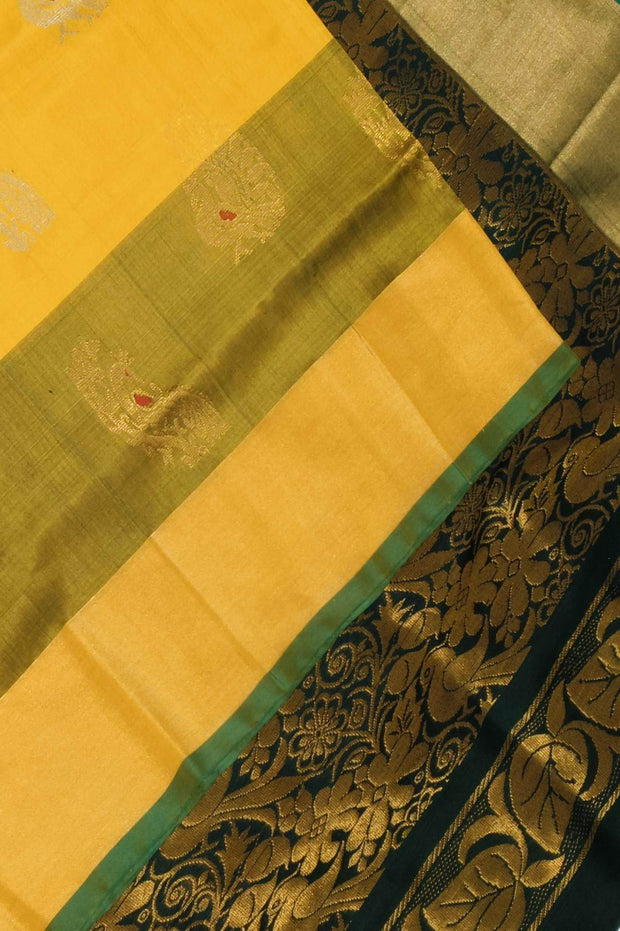 Handloom Uppada pure silk saree in yellow & bottle green  with  peacock motifs