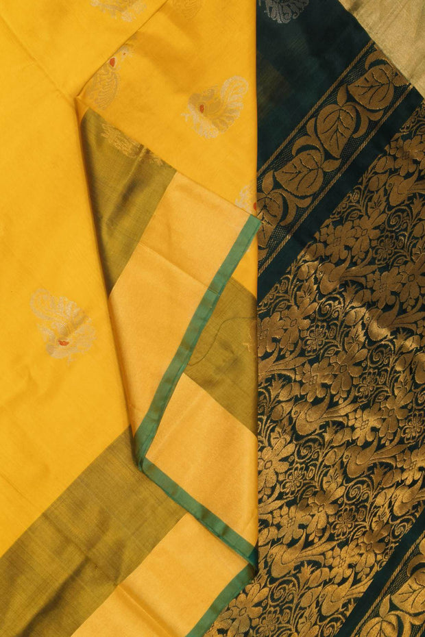 Handloom Uppada pure silk saree in yellow & bottle green  with  peacock motifs