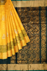 Handloom Uppada pure silk saree in yellow & bottle green  with  peacock motifs