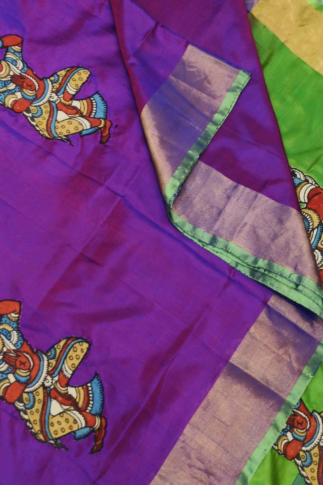 Kalamkari applique on Uppada pure silk saree in  purple & green