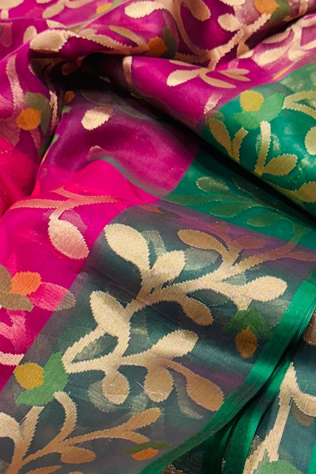 Muslin organza saree in pink  & green  in jamdani weave