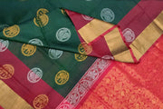 Handwoven Uppada pure silk saree in bottle green with gold & silver motifs .