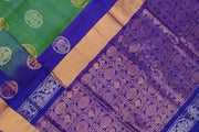 Handwoven Uppada pure silk saree in double shaded  green with gold & silver motifs .