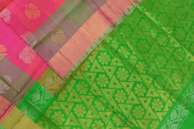 Handwoven Uppada pure silk saree in reddish pink with gold & silver motifs .