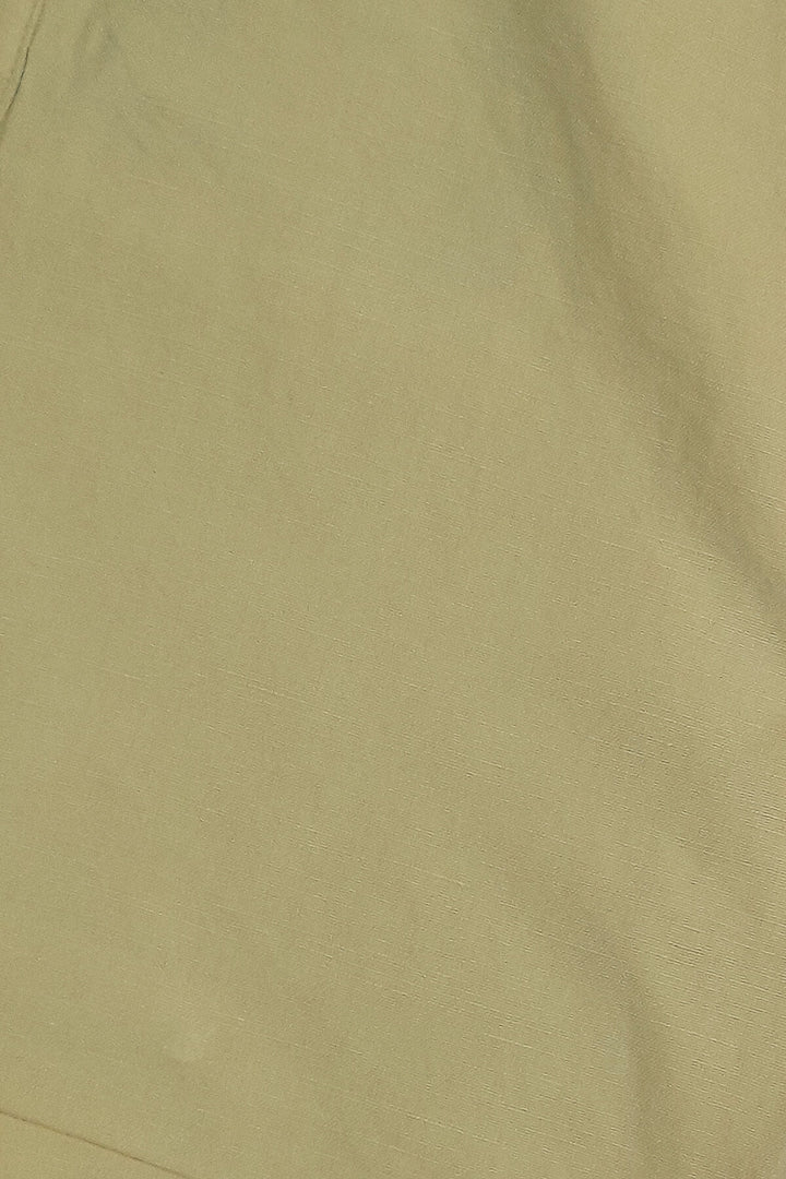 Solid linen shorts with stretchable waist and pockets in beige