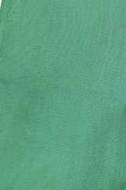 Solid linen shorts with stretchable waist and pockets in teal green