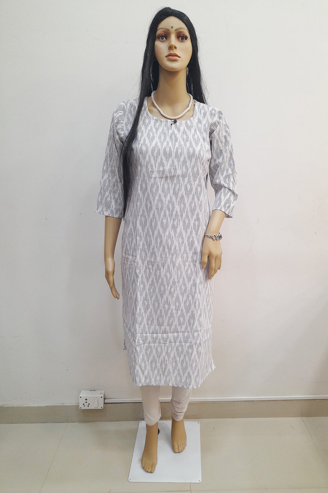 Handwoven ikat cotton kurti in straight cut in white