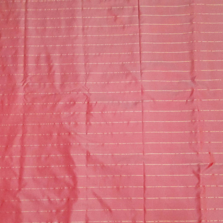 Pure silk fabric in double shaded onion pink with zari stripes