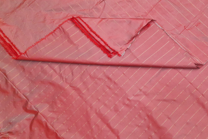 Pure silk fabric in double shaded onion pink with zari stripes
