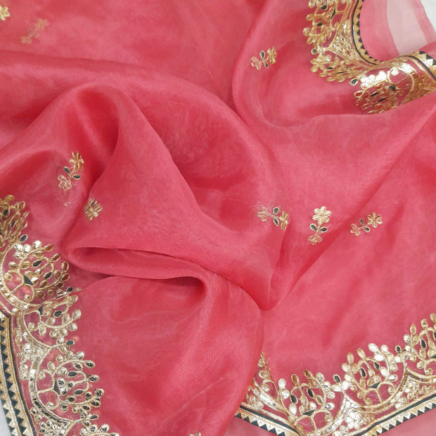 Carrot orange colour organza saree with gotta patti work