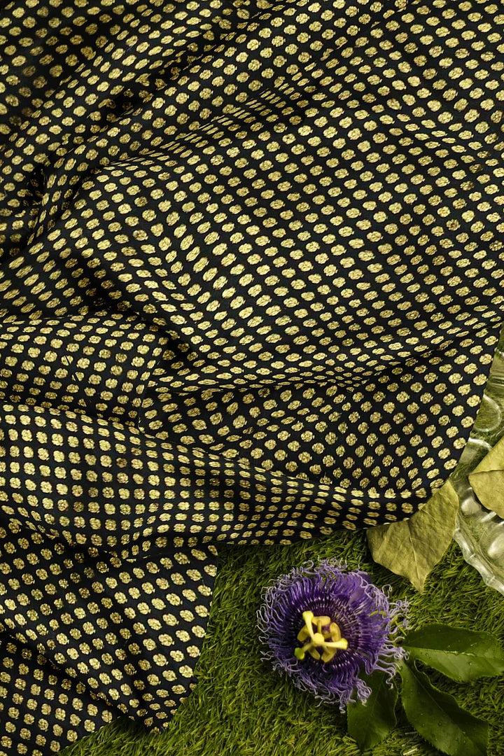 Banarasi  silk fabric in black  . Available in multiples of 1M & 2.5M