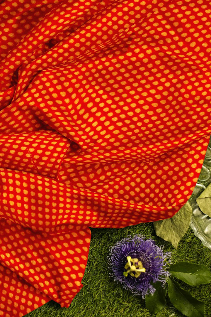 Banarasi  silk fabric in red. Available in multiples of 1M & 2.5M