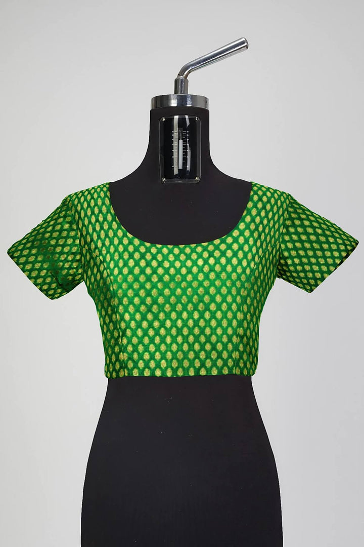 Banarasi  silk fabric in green  . Available in multiples of 1M & 2.5M