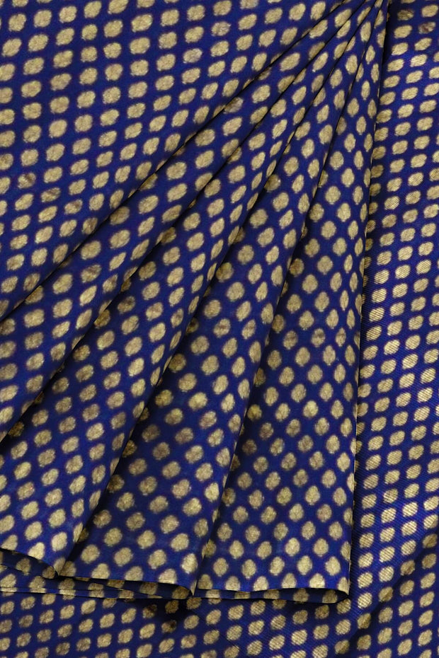 Banarasi  silk fabric in navy blue . Available in multiples of 1M & 2.5M
