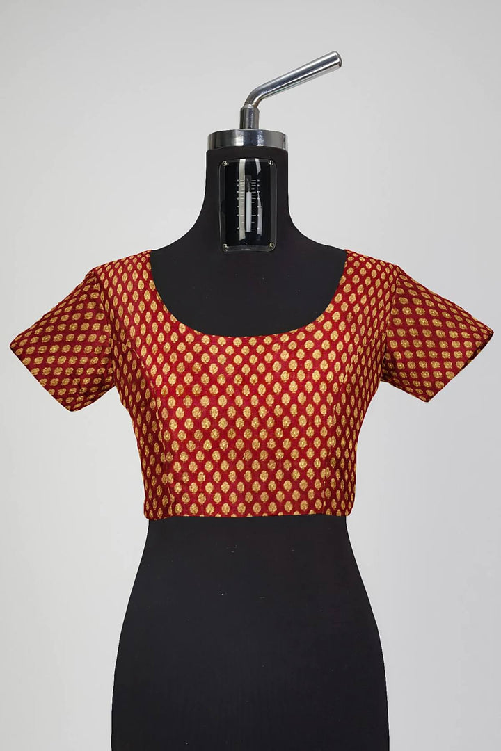 Banarasi  silk fabric in maroon . Available in multiples of 1M & 2.5M