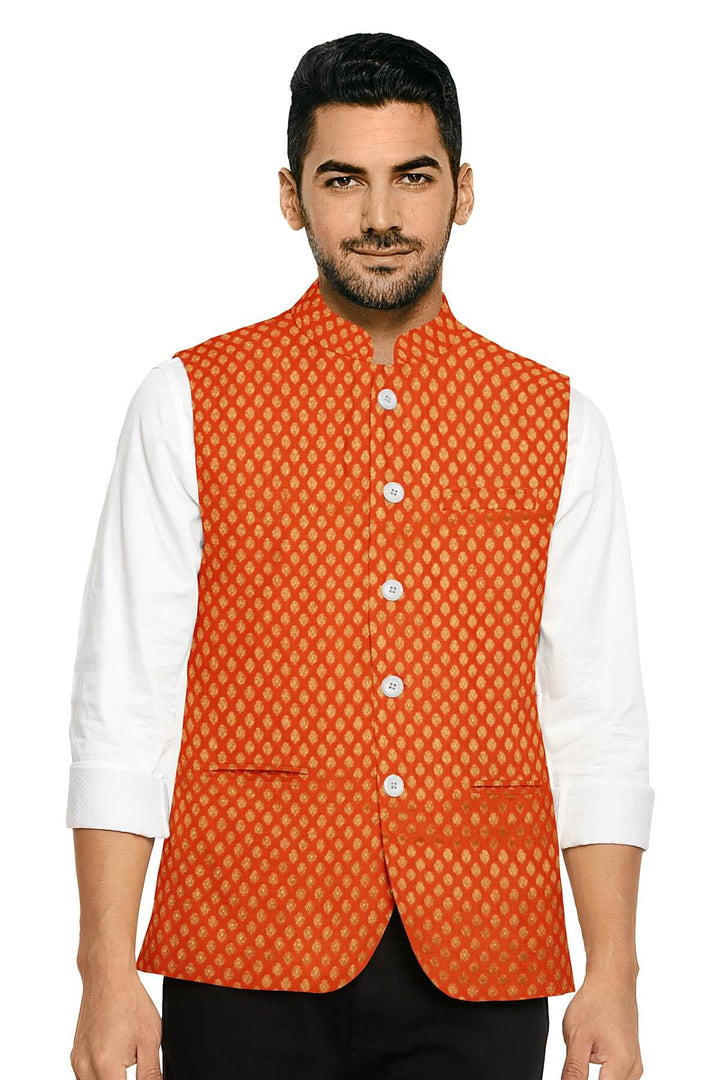 Banarasi  silk fabric in orange. Available in multiples of 1M & 2.5M