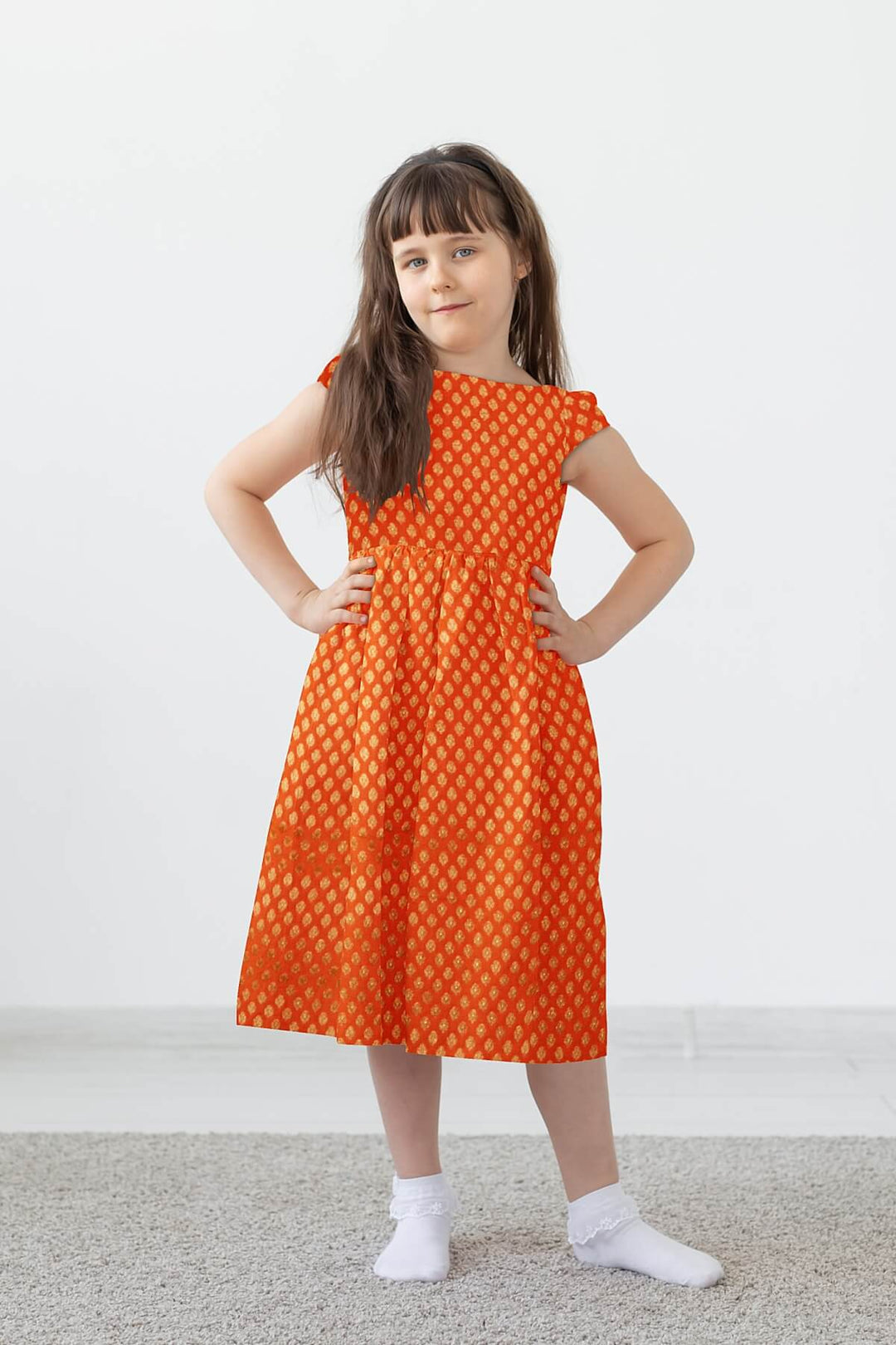 Banarasi  silk fabric in orange. Available in multiples of 1M & 2.5M