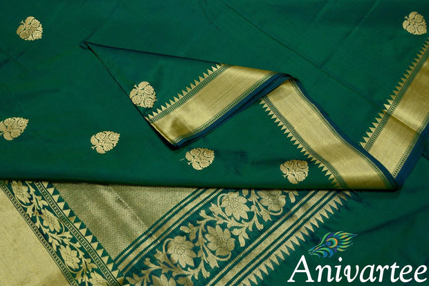 Handloom Banarasi katan pure silk saree in dark green with big buttas